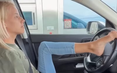 woman-born-without-upper-limbs-driving-with-feet