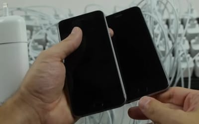 Man plugs 100 chargers into an iPhone at once to see if it gives it an instant charge