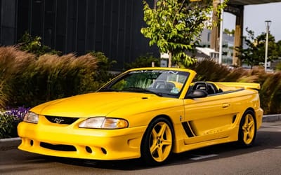 We are selling George Foreman's iconic 1995 yellow convertible Ford Mustang and it's currently less than $40,000