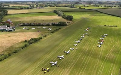 This house has an aerodrome in the back garden to store a massive private plane collection