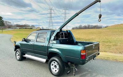 Unbelievably rare Toyota Hilux truck with factory bed crane option randomly popped up on Facebook Marketplace in New Jersey