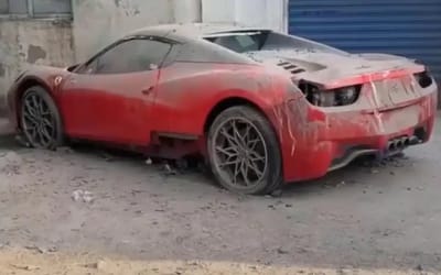 Men restored destroyed Ferrari 458 to its former glory