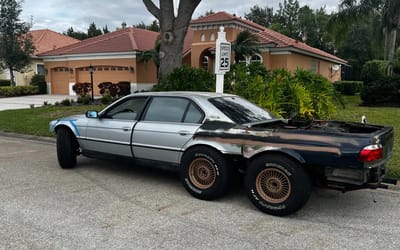 This isn't just any BMW, it's a V12 hybrid 6x6 BMW truck with a Tesla motor