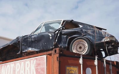 Guys picking up the world's cheapest Porsche 911 unbelievably drive what's left of it back to LA