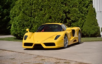 A yellow Ferrari Enzo just shattered expectations by selling for a record $17,900,000 at auction