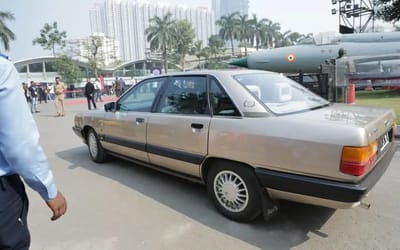 Former Indian cricketer Ravi Shastri shows off his famous Audi 100 at a supercar meet in Mumbai