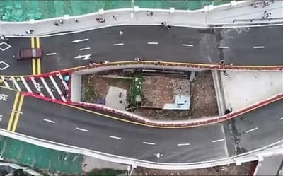 Chinese city Guangzhou built huge bridge around small house after owner refused to move