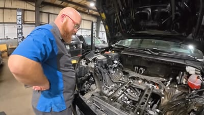 chevy-silverado-ev-car-wizard-mechanic-hoovies-garage