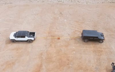 New Hummer EV and original Hummer H1 go head-to-head in tug of war to settle once and for all whether electric reigns supreme