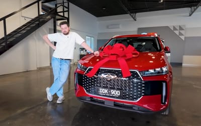 man-falls-to-knees-after-seeing-extremely-cheap-suv-from-china