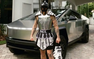 Jake Paul shares bizarre video of him fighting a Tesla Cybertruck to promote his next fight