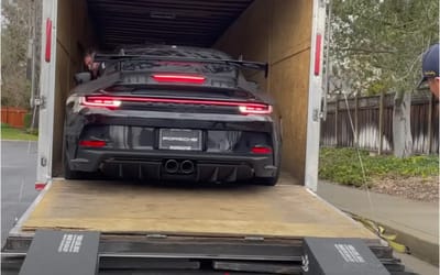 Man shares his Porsche 992 GT3 being delivered after months of searching for the perfect car and faces an anxious moment during delivery