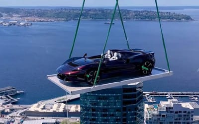 McLaren Elva lifted 48 stories to a Seattle penthouse in an ultimate display of wealth