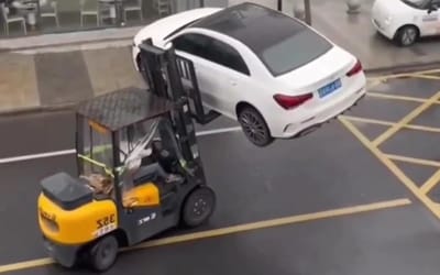 Illegal parking turns messy in China as Mercedes A-Class is lifted by forklift in controversial move