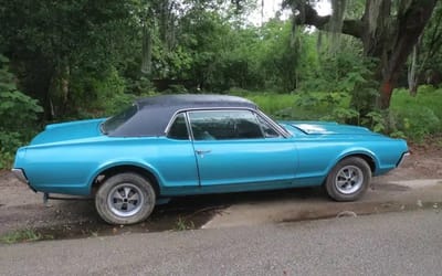 Man finds 1967 Mercury Cougar XR-7 behind 20 other cars in barn find, realizes he’s uncovered a gem
