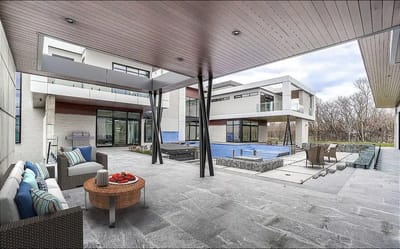 Canada’s most-viewed house is on sale for $14.4m and has a 95-car garage, 11 bathrooms and glass elevator