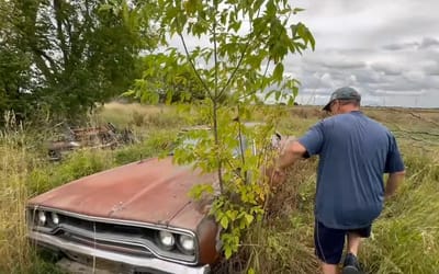 Man exploring Canadian island found an abandoned 1970 Plymouth Road Runner buried beneath weeds