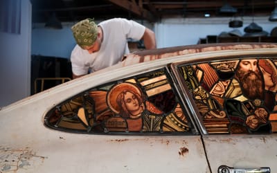 LA man creates art out of abandoned Porsche 911 with stained glass windows