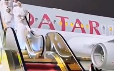 A gold-plated escalator is how Qatari royals step off their flying palace