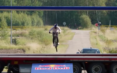 red-bull-daredevil-attempts-impossible-gap-one-second-jump-between-two-trucks