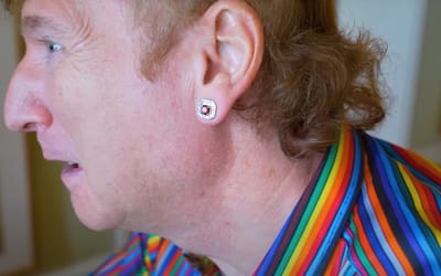 Man stunned to find out true value of red diamond earring he's casually wearing that he bought for less than $1M