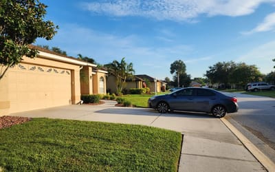 A Florida woman owes over $100,000 in fines because her tire touched the grass on her own driveway
