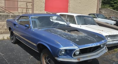 What looks like an ordinary office in Ohio conceals a jaw-dropping secret collection of over 50 muscle cars