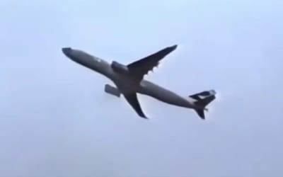 An Airbus A330 looks suspended in the sky, a rare moment where airspeed outpaces ground speed in high-alpha flight