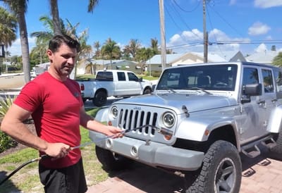 US man buys 16-year-old son a cheap 2009 Jeep Wrangler for his first car at auction and begins restoring it