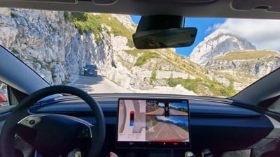 self-driving-tesla-model-3-highland-mountain-road