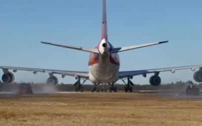 Boeing 747 revved up to produce EF5 tornado level wind force to see if 'tornado-proof' armored cars can withstand it