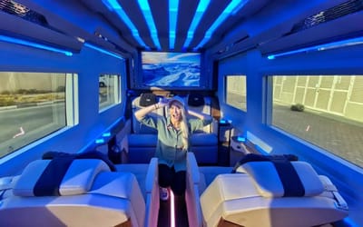 Supercar Blondie was in a car that's a movie theater on wheels and it's so big she can actually stand up