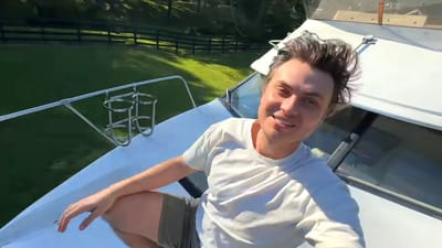Virginia man drives his Tesla Cybertruck on 1,000-mile road trip to buy the cheapest yacht in the US and when he arrives he's left stunned