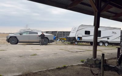 Canadian puts Tesla Cybertruck to the test towing his trailer, shocked by range results