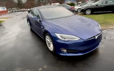 Technicians fix Tesla fault in Florida garage using professional tools for a fraction of Tesla’s repair quote