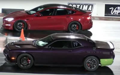 A Dodge Challenger R/T drag raced Tesla Model S Plaid and there was room for several buses between the winner and loser