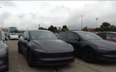 Hundreds of unsold Teslas have been kicked out of Michigan parking lot by court order