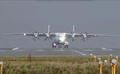 Antonov An-22 soars from take-off in crosswind conditions that showcase the haunting sound it makes