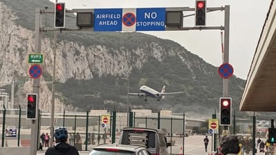 Most surreal airport in the world has cars stopping to allow planes to take off from a runway they drive over