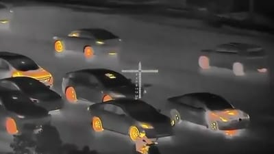 Highway traffic viewed through thermal cameras reveals exactly how much heat every car actually produces and gas vs EV is very different