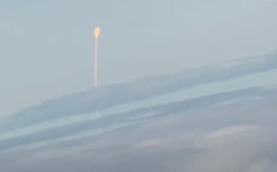 Captain tells man on flight out of Florida to look out the window as Artemis II passes by in once-in-a-lifetime moment