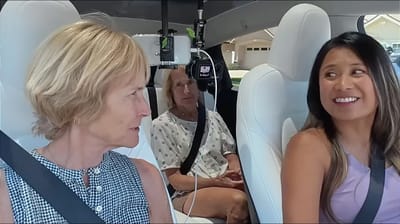 US woman with 2025 Tesla Legacy Model Y turns on Full Self Driving while passenger has no idea it exists and her reaction is priceless