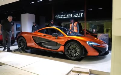 Man can’t believe the $6 million worth of cars on display at Harrods with one stealing the show