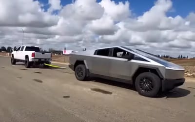 Tesla Cybertruck faces off against diesel Chevy Silverado in tug-of-war and it can’t even be completed