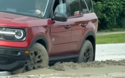 Michigan Ford Bronco driver had lapse in concentration and paid the price for driving into fresh concrete
