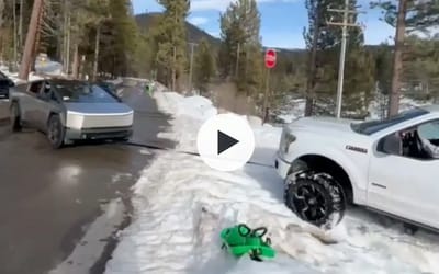 Cybertruck demonstrates real pulling power on pick-up truck in snow