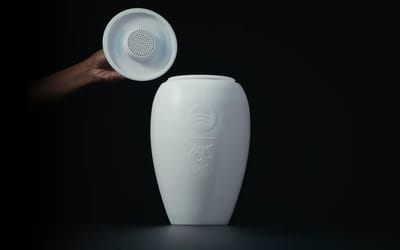 Liquid Death and Spotify just dropped a funeral urn with a built-in speaker so you can party into the afterlife