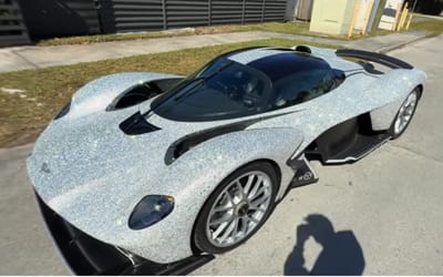 Man shows the aftermath as he takes the stunning crystal-bedazzled wrap off $4,000,000 Aston Martin Valkyrie Spider