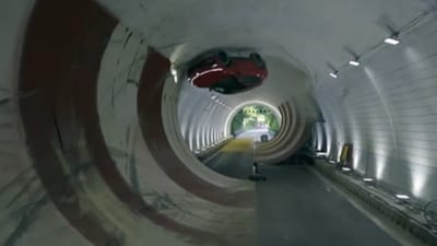 China just made Mercedes' dream from 16 years ago a reality by driving a 5,700lb electric SUV across tunnel's ceiling with 360-degree loop