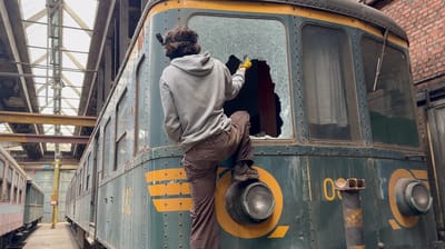 Explorers find hundreds of rotting trains in abandoned warehouse and one is too dangerous to enter